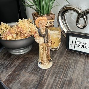 Rare old man with cane holding chicken figurine